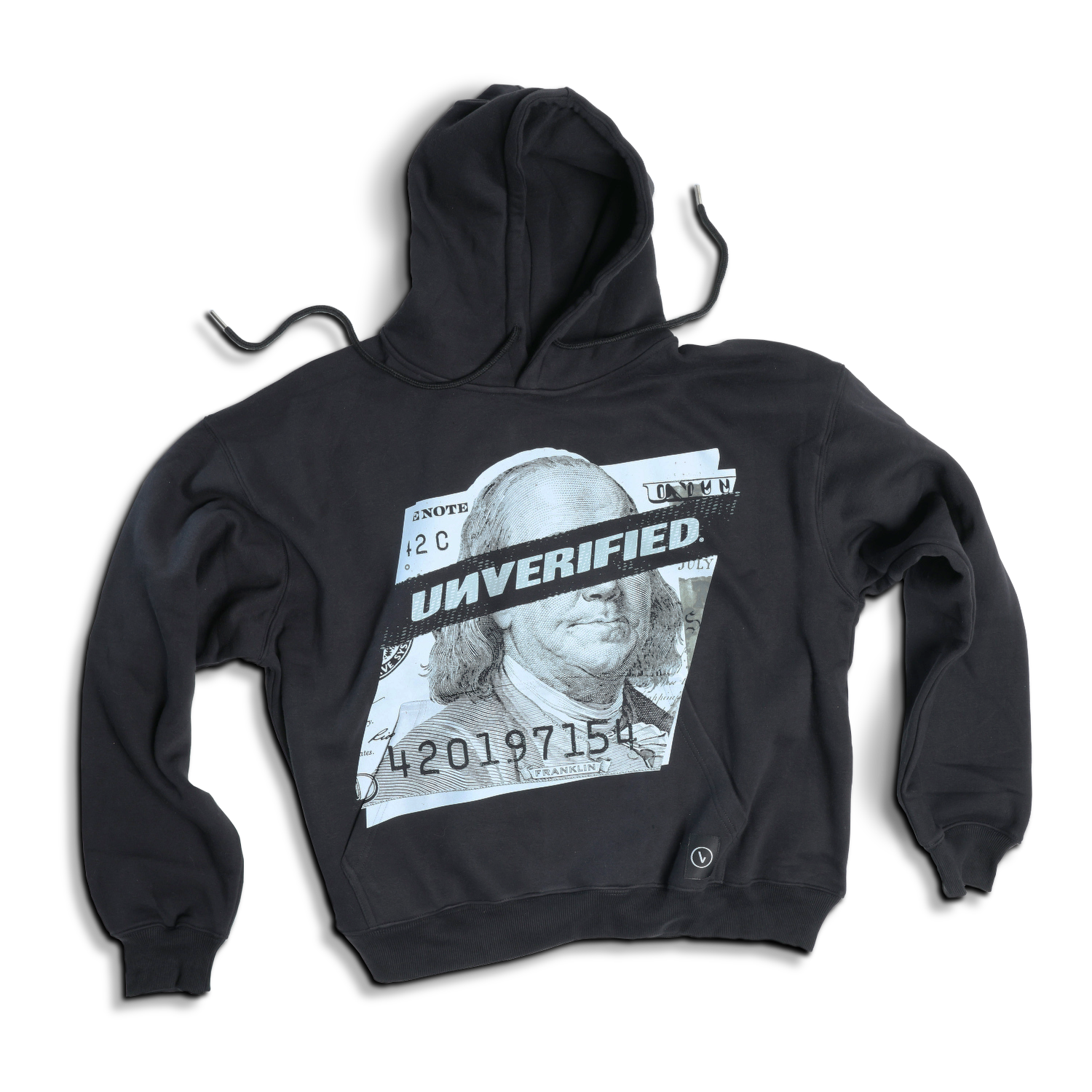 Cream-colored hoodie on a wood-textured background.
